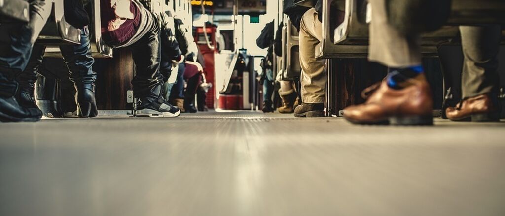 People feet train travelling large